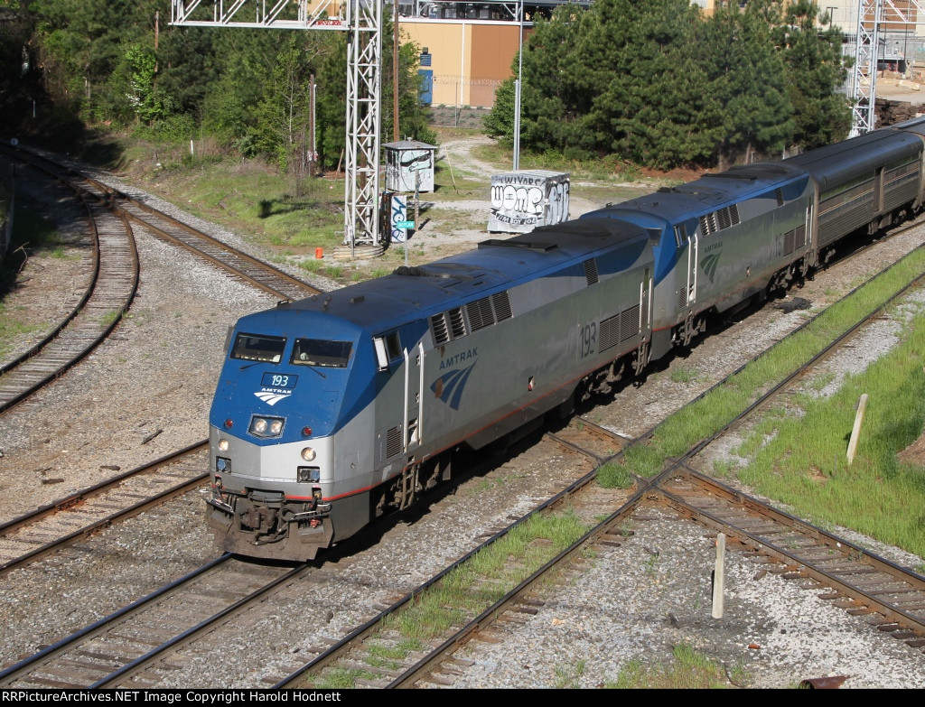 AMTK 193 & 16 lead train P092 across the diamonds at Boylan